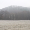 Der winterliche Schlossberg von Westen gesehen.